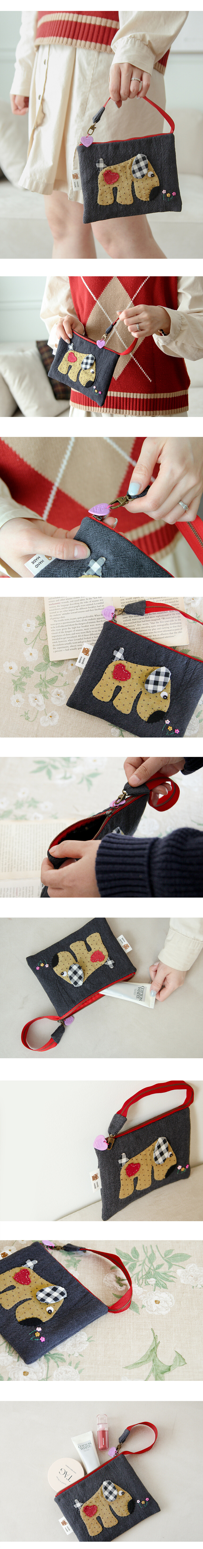 킁킁도그파우치착용및활용이미지,손에든미니파우치,지퍼여밈,강아지아플리케디자인,스트랩휴대